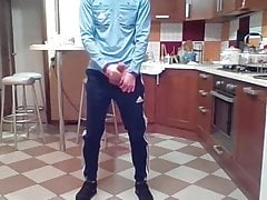 young guy shows in mothers kitchen