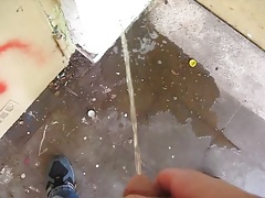 pissing in a good friends pee puddle in abandoned building
